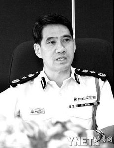 姓名：邓竟成年龄：52岁职务：香港警务处处长 摄影/武仲林