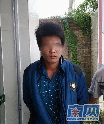 疑犯谭某华 疑犯谭某华